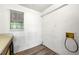 Bright laundry room with window, counter space, and in-unit washer hookups at 2290 Wilkins Cv, Decatur, GA 30035