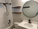 Updated bathroom featuring a shower with white subway tiles and a modern sink at 1003 Valley Se Dr, Smyrna, GA 30080