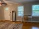 Inviting living room with hardwood floors, natural light, and an area for a dedicated workspace at 1003 Valley Se Dr, Smyrna, GA 30080