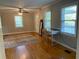 Bright and airy living room with hardwood floors, a ceiling fan, and ample natural light at 1003 Valley Se Dr, Smyrna, GA 30080