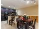 Cozy dining area with dark wood cabinets, breakfast bar, and table with seating at 1255 Mcminn Way, Snellville, GA 30078