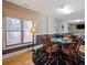Game room with wood floors, game table, natural light, and decorative rug at 1255 Mcminn Way, Snellville, GA 30078