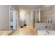 Bathroom featuring walk-in shower, soaking tub, double vanity with granite countertop at 339 Cherryhill Ln, Woodstock, GA 30188