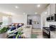 Bright kitchen featuring stainless steel appliances, granite countertops, and a breakfast bar at 339 Cherryhill Ln, Woodstock, GA 30188