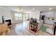 Open concept living room with fireplace, and stainless steel appliances at 339 Cherryhill Ln, Woodstock, GA 30188