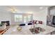 Open concept living room with fireplace and granite counters with stainless steel appliances at 339 Cherryhill Ln, Woodstock, GA 30188