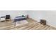 Cozy living space with wood floors, a patterned rug, and modern furnishings at 339 Cherryhill Ln, Woodstock, GA 30188
