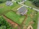 Beautiful home featuring a spacious backyard with a privacy fence and mature trees at 108 Donovan Ave, Locust Grove, GA 30248