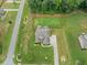 Enjoy the privacy of the fenced backyard in this home with lush landscaping and mature trees at 108 Donovan Ave, Locust Grove, GA 30248