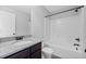 Modern bathroom boasts a combination shower-tub, granite countertop, and sleek fixtures at 108 Donovan Ave, Locust Grove, GA 30248
