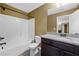 Charming bathroom featuring granite countertops, modern fixtures, and a shower-tub combination at 108 Donovan Ave, Locust Grove, GA 30248