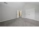 Inviting bedroom with vaulted ceiling, plush carpeting, and ample natural light for a serene atmosphere at 108 Donovan Ave, Locust Grove, GA 30248