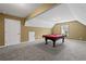 Upstairs game room includes a full size pool table and neutral walls at 108 Donovan Ave, Locust Grove, GA 30248