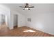A secondary bedroom featuring laminate flooring and vaulted ceilings at 172 White Rose Ln, Temple, GA 30179