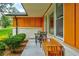 Inviting front porch with seating area, perfect for relaxing outdoors at 2200 Glendale Dr, Atlanta, GA 30032