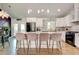 Modern kitchen with white cabinets, a center island, and stainless steel appliances at 2200 Glendale Dr, Atlanta, GA 30032