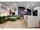 Spacious open-concept living area with large sectional sofa and stylish kitchen at 2200 Glendale Dr, Atlanta, GA 30032