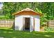 This backyard shed has a wood frame, exposed rafter tails and a wide open double door at 2200 Glendale Dr, Atlanta, GA 30032