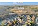 An aerial view of Buford, GA, showcases a home near Bogan Park, Lanier Pkwy and Lake Lanier at 4055 Inman Park Ln, Buford, GA 30519