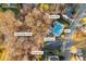 Aerial shot showcases the neighborhood pool, splash pad, and clubhouse at 4055 Inman Park Ln, Buford, GA 30519