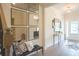Bright entryway with modern decor, stylish mirrors, and a charming bench at 525 Paces Dr, Lithia Springs, GA 30122