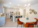 Modern kitchen featuring gray cabinetry, stainless steel appliances, and a stylish breakfast nook at 525 Paces Dr, Lithia Springs, GA 30122