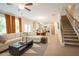 Open concept living space with a view of the modern kitchen and staircase at 525 Paces Dr, Lithia Springs, GA 30122