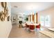 Open-concept living space with kitchen, dining area, living room and fireplace at 525 Paces Dr, Lithia Springs, GA 30122