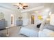 Well-lit main bedroom with ensuite bathroom and walk in closets at 525 Paces Dr, Lithia Springs, GA 30122