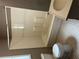 Bathroom features a shower, toilet, and sink at 3155 E East Point E St, East Point, GA 30344