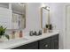 Elegant bathroom with double vanities, modern fixtures, and a stylish mirror for a spa-like experience at 1505 Ezra Church Nw Dr, Atlanta, GA 30314