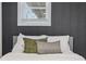 Bedroom close-up features a queen bed, decorative pillows and a view to the outside at 1505 Ezra Church Nw Dr, Atlanta, GA 30314
