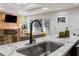 Modern kitchen design highlights a quartz countertop, sleek faucet, and contemporary decor at 1505 Ezra Church Nw Dr, Atlanta, GA 30314