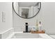 Close up of a modern bathroom sink with stylish fixtures and decor at 1566 Ezra Church Nw Dr, Atlanta, GA 30314