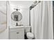 Contemporary bathroom with updated vanity, stylish mirror, and walk in shower with curtain at 1566 Ezra Church Nw Dr, Atlanta, GA 30314