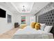 Modern bedroom boasts a decorative headboard and an abundance of natural light at 1566 Ezra Church Nw Dr, Atlanta, GA 30314