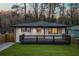 Charming renovated home featuring a deck, updated paint and new landscaping at 1566 Ezra Church Nw Dr, Atlanta, GA 30314