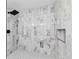 Contemporary shower features marble-like tile surround, a rain shower head, and a built-in shelf at 1566 Ezra Church Nw Dr, Atlanta, GA 30314