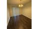 Light dining area featuring laminate floors and a chandelier at 2340 Beaver Ruin Rd # Un37, Norcross, GA 30071