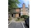 Inviting townhome exterior with charming landscaping and convenient parking at 2340 Beaver Ruin Rd # Un37, Norcross, GA 30071