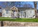 Charming home with updated siding, manicured lawn, and welcoming front porch, offering great curb appeal at 749 Bonnie Brae Sw Ave, Atlanta, GA 30310