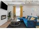 Comfortable and stylish living space featuring a fireplace, modern furniture, and bright natural light at 749 Bonnie Brae Sw Ave, Atlanta, GA 30310