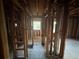 Unfinished interior featuring wood floors and studs, awaiting customization at 1713 Cahoon Sw St, Atlanta, GA 30310