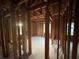 Unfinished interior with natural light and wood frame construction waiting to be customized at 1713 Cahoon Sw St, Atlanta, GA 30310