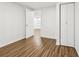 Finished basement featuring a closet and laminate flooring, with an open doorway to another room at 502 Bridge Se Ln, Smyrna, GA 30082
