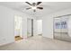 Bright, neutral bedroom with closet and bathroom entrance at 502 Bridge Se Ln, Smyrna, GA 30082