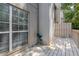 View of a home's deck with a chair next to a window, as well as a white railing at 502 Bridge Se Ln, Smyrna, GA 30082