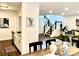 Charming dining area featuring a modern table, adjacent to the open kitchen and living spaces at 502 Bridge Se Ln, Smyrna, GA 30082