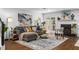 Comfortable living area featuring a fireplace, stylish furnishings, and french doors to the outside at 502 Bridge Se Ln, Smyrna, GA 30082