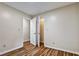 Bedroom featuring wood-look floors and a double-door closet at 6211 Ward Rd, Union City, GA 30291